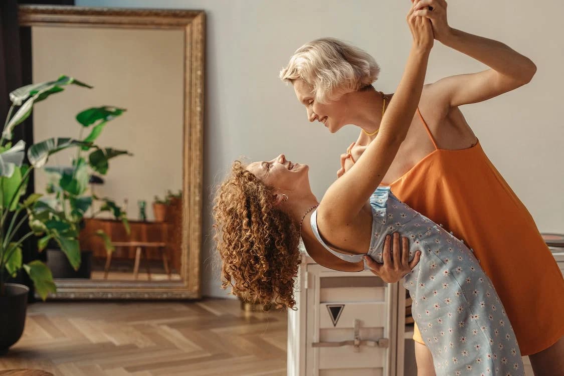 Couple dancing at home